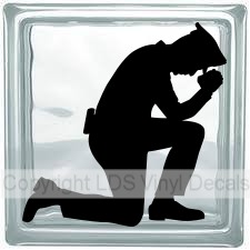 Kneeling Police Officer
